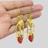 Retro Punk Dagger Hand Halloween Earrings: Dark Style Fashion Statement
