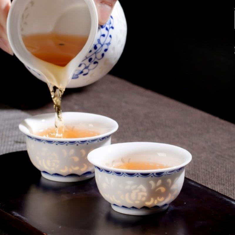 Hand drawn blue and white exquisite tea cup hollowed out ceramic Kung Fu single cup tea set teacup