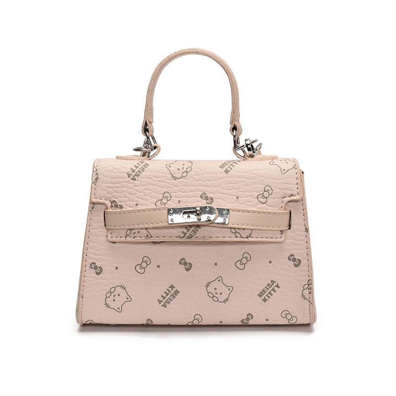 This year, the Korean version of the popular temperament cute printed portable Kelly bag niche light luxury versatile foreign style messenger wom