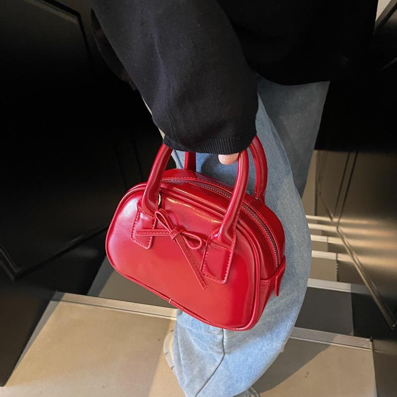 New niche high-end bag women's fashion portable shell bag bow pillow bag shoulder messenger bag