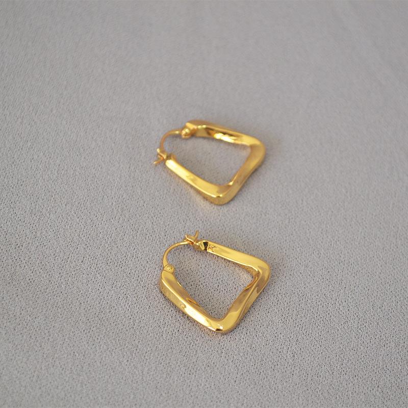 INS Geometric Twisted Metal Triangle Earrings for Women.
