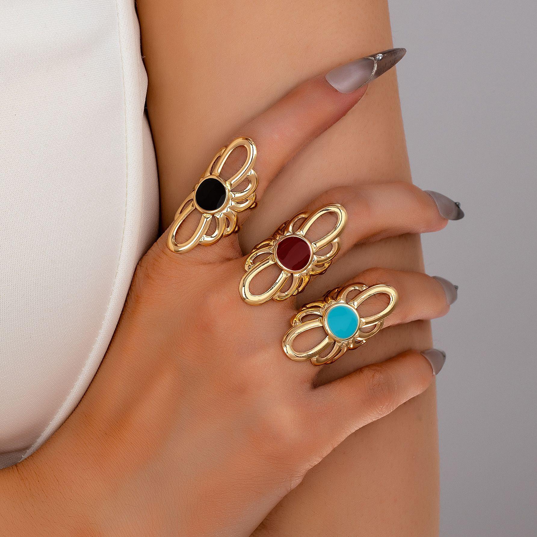 

Fashionable hollow flower open ring синій