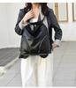 Women's Versatile Luxury Backpack: Large Capacity Textured Shoulder & Crossbody Tote Bag