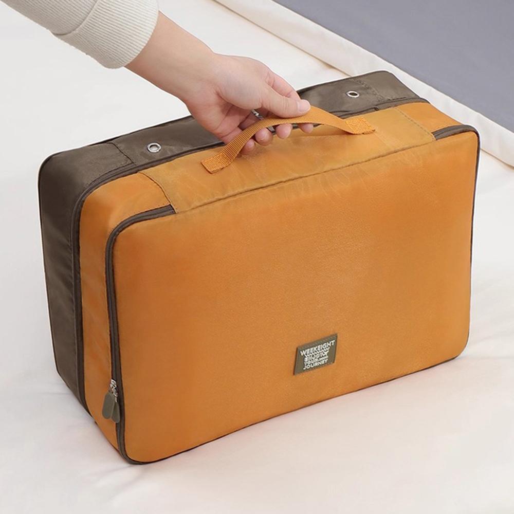 

Creative two-color splicing travel clothing storage bag, double-layer household compression seasonal down jacket, cotton quilt s темно-желтого