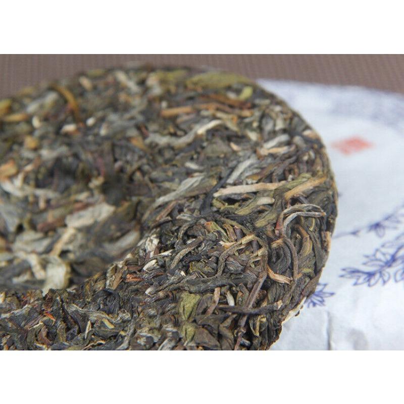 100 g Yunnan Menghai He Kai Sun Green Pu-erh Tort cu ceai crud Ceai cu șapte semințe
