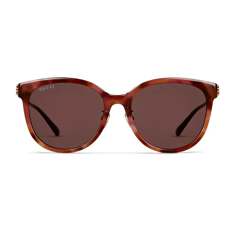 

GUCCI Gucci temples are decorated with interlocking double G and webbing metal acetate round sunglasses women s brown F коричневый