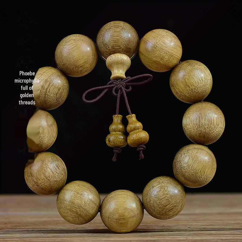 

Мужской браслет с бусинами Будды 20 мм: Мелколистный Нанму и золотистое черное дерево 20mm*19 pieces [tassel style]