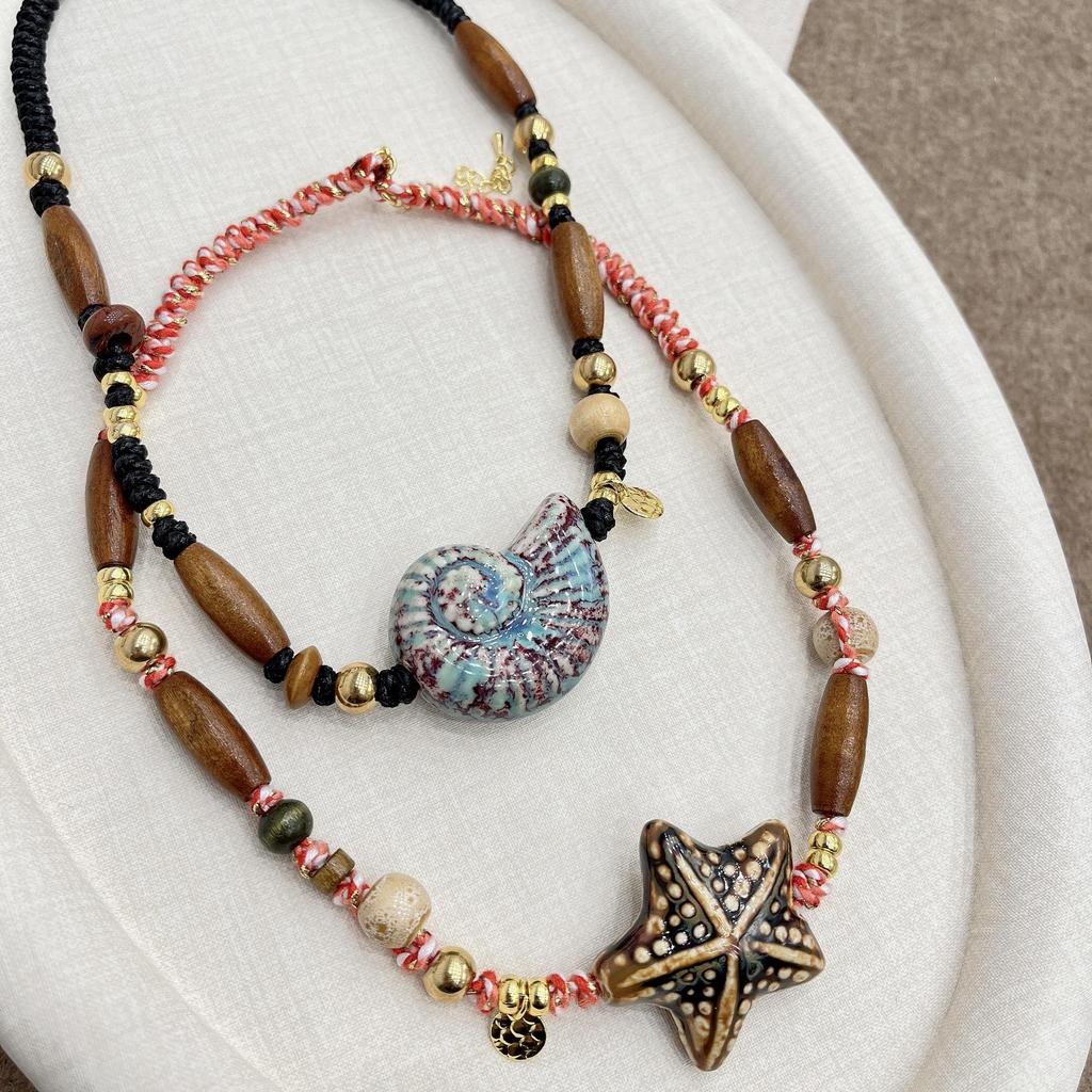 Retro Conch Long Necklace for Women: Unique Niche Design, High-End Sweater Chain, Versatile Accessory for Autumn & Winter