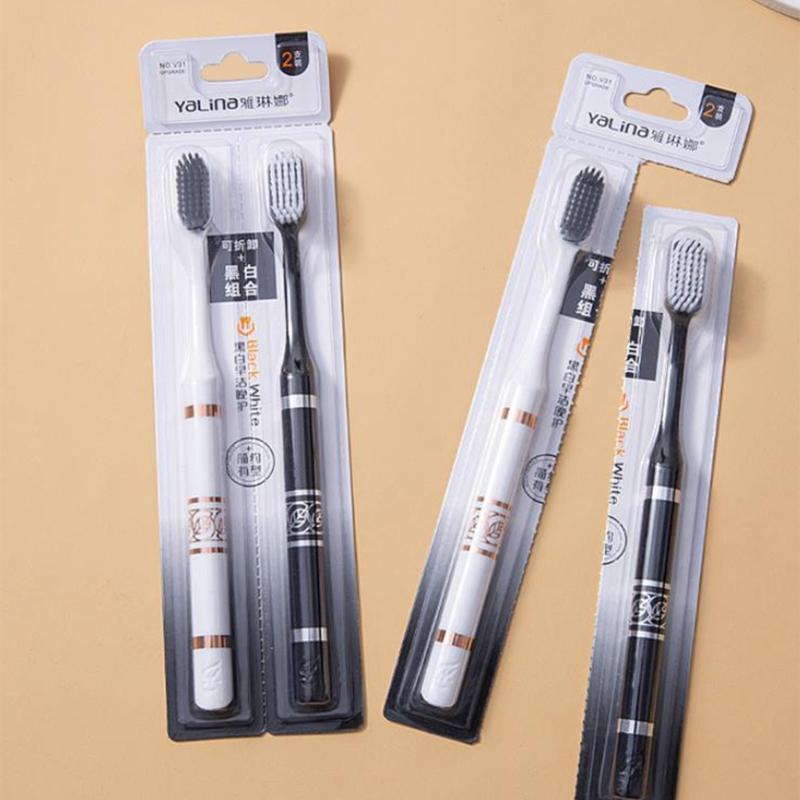 Ergonomic Black and White Toothbrush Set for Couples Portable Gentle Cleaning