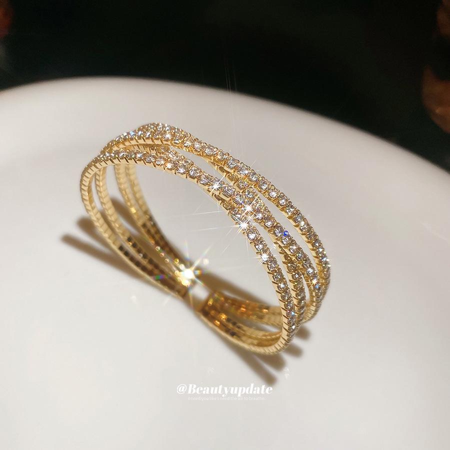 Elegant Diamond-Studded Geometric Multi-Layer Open Bangle - Luxurious French High-End Jewelry.