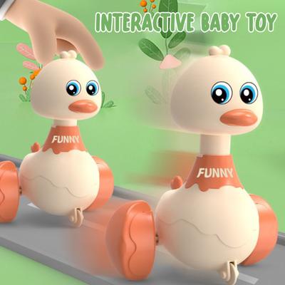 Kids Walking Duck Toy Press Go Inertial Drive Pull Back 360 Degrees Rotatable Head Duck Car