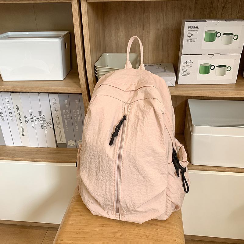 

Solid color schoolbag female college student retro outdoor mountaineering bag light casual backpack male large capacity travel backpack розовый