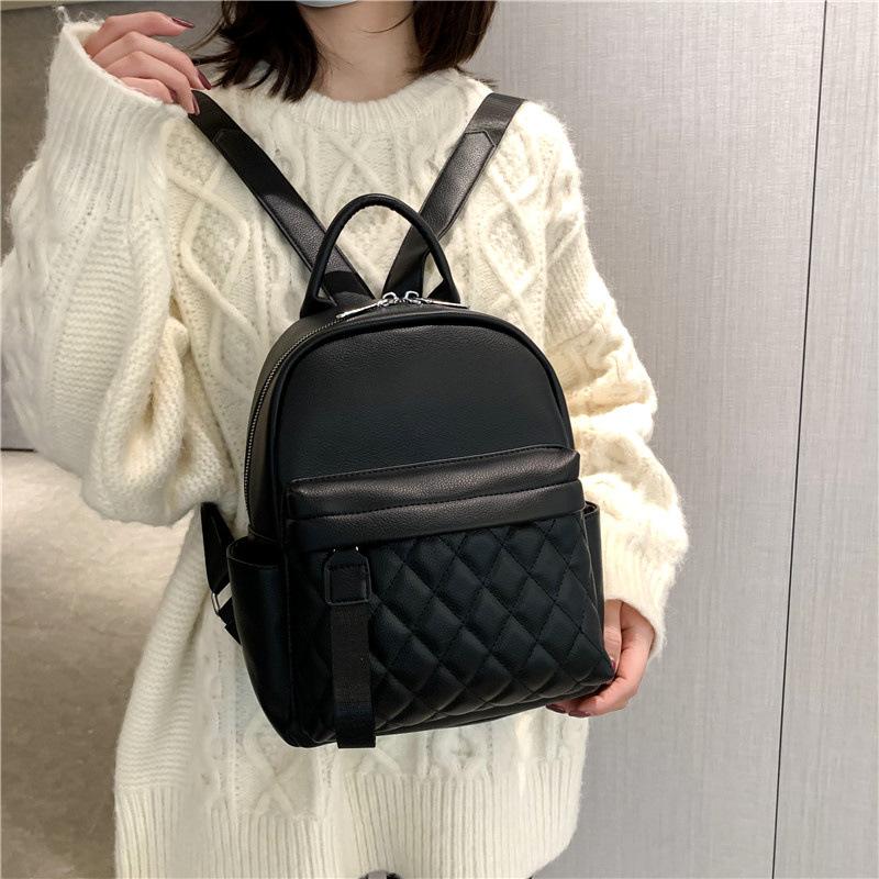 

Commuter Xiaoxiangfeng backpack female college student simple, small and large-capacity backpack fashionable versatile leather leisure bag чорний