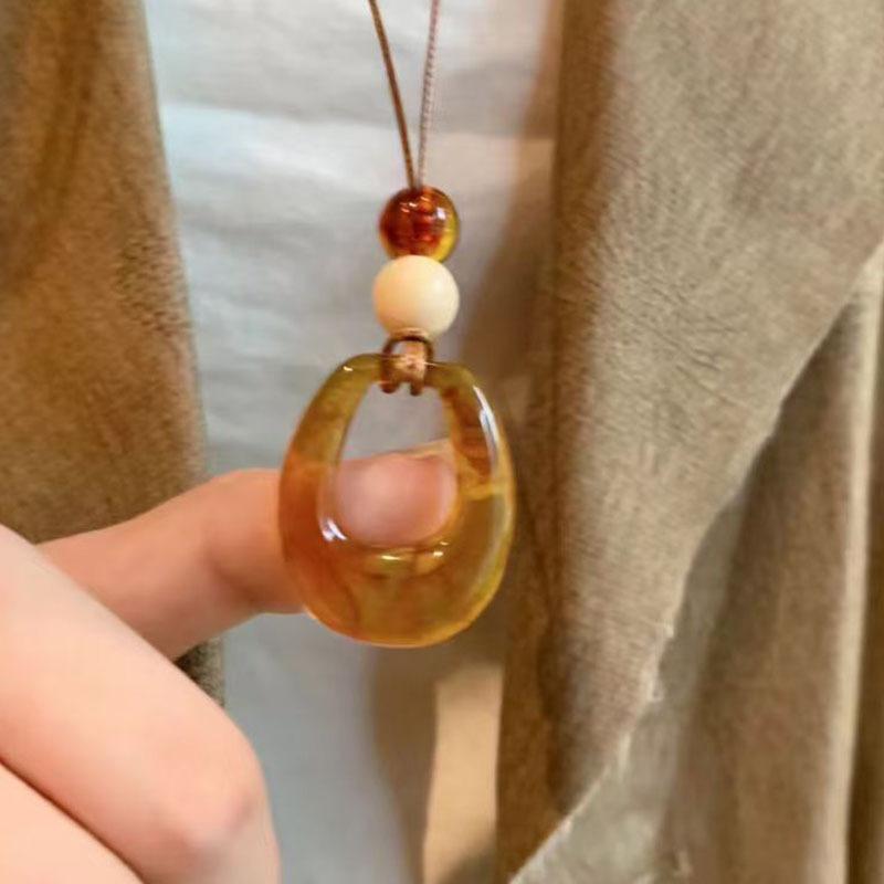 New Chinese amber stone ring pendant necklace female ethnic style retro long sweater chain niche versatile collarbone chain
