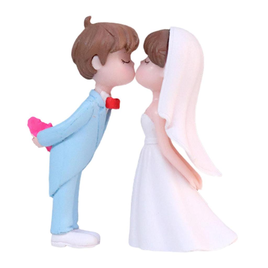 Charming Wedding Cake Topper Featuring Miniature Bride and Groom