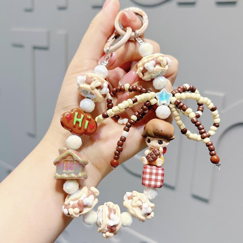 

Handcrafted Stylish Beaded Keychain Featuring Charming Designs For Gift Giving And Keepsakes Hi Chocolate Boy