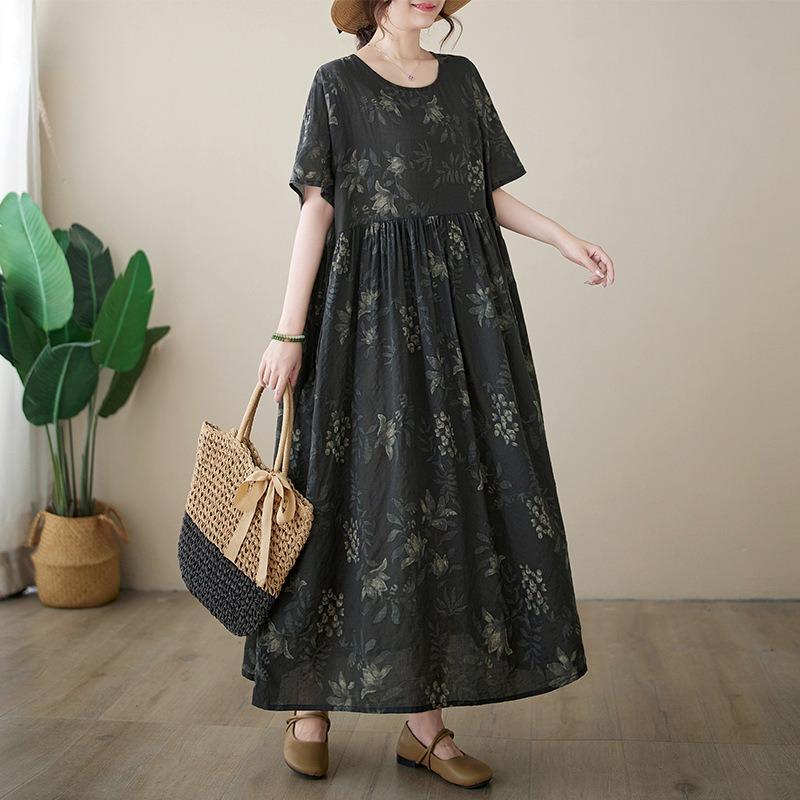 The Real Shot Is a New Summer Simple Literary and Loose Large-size Short-sleeved Round Neck Printed Dress for Women.
