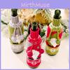 Stylish Christmas Knitted Wine Bottle Wrap In Vibrant Green And Red Colors For Elegant Holiday Table Settings