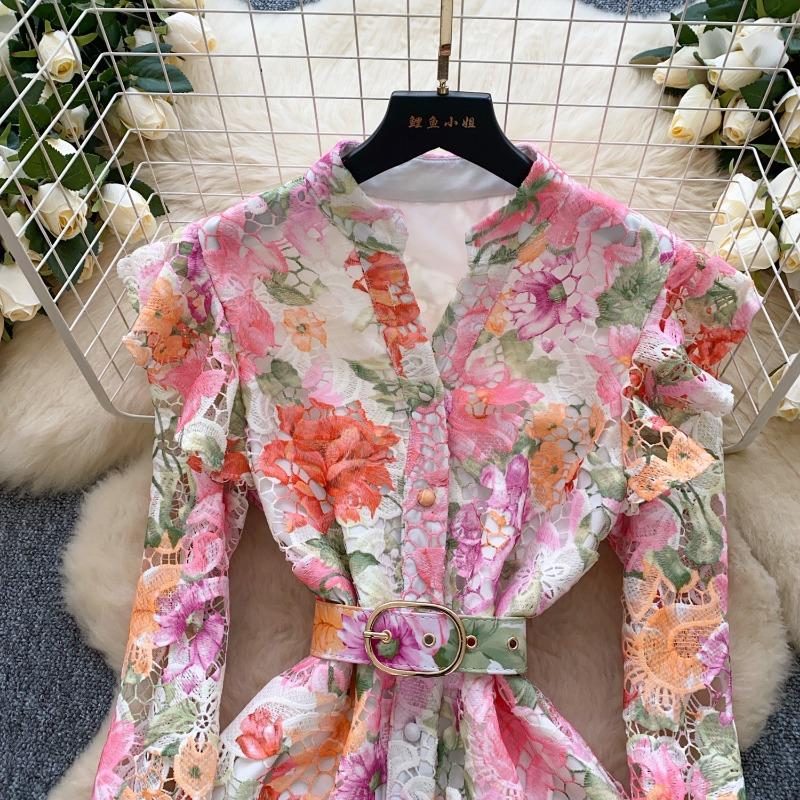 A Summer Women's Printed Dress with Flared Sleeves and Hollowed-out Crochet Design Featuring A Stylish Look