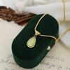 French Transparent Green Water Drop Ocean Necklace with Snake Bone Chain - Fashionable Gold-Plated Titanium Steel.