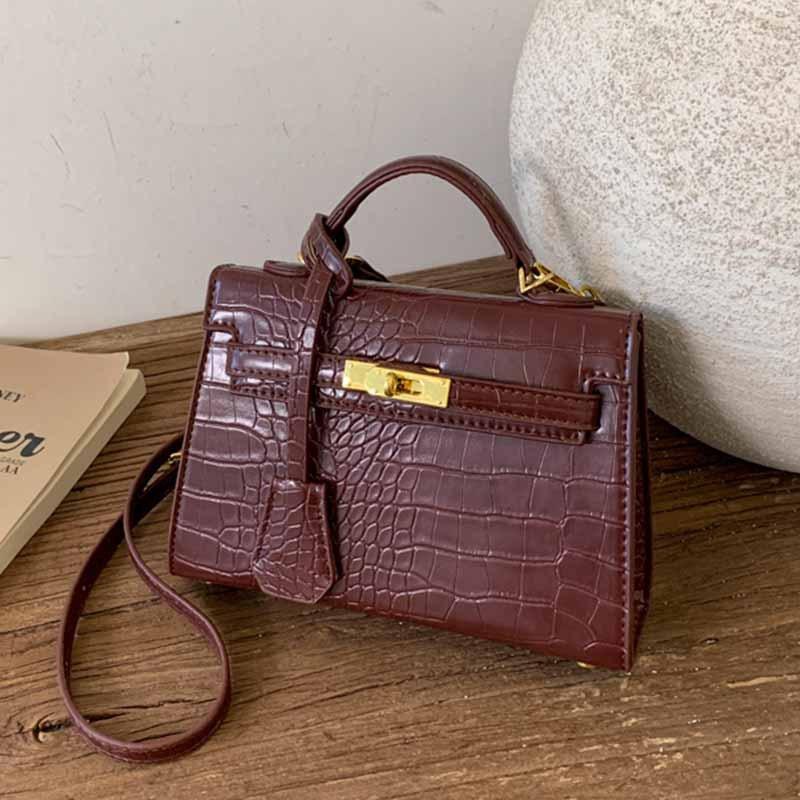 Hand-held small bag women's versatile 2025 new autumn and winter fashion texture cross-body small bag high-end shoulder bag