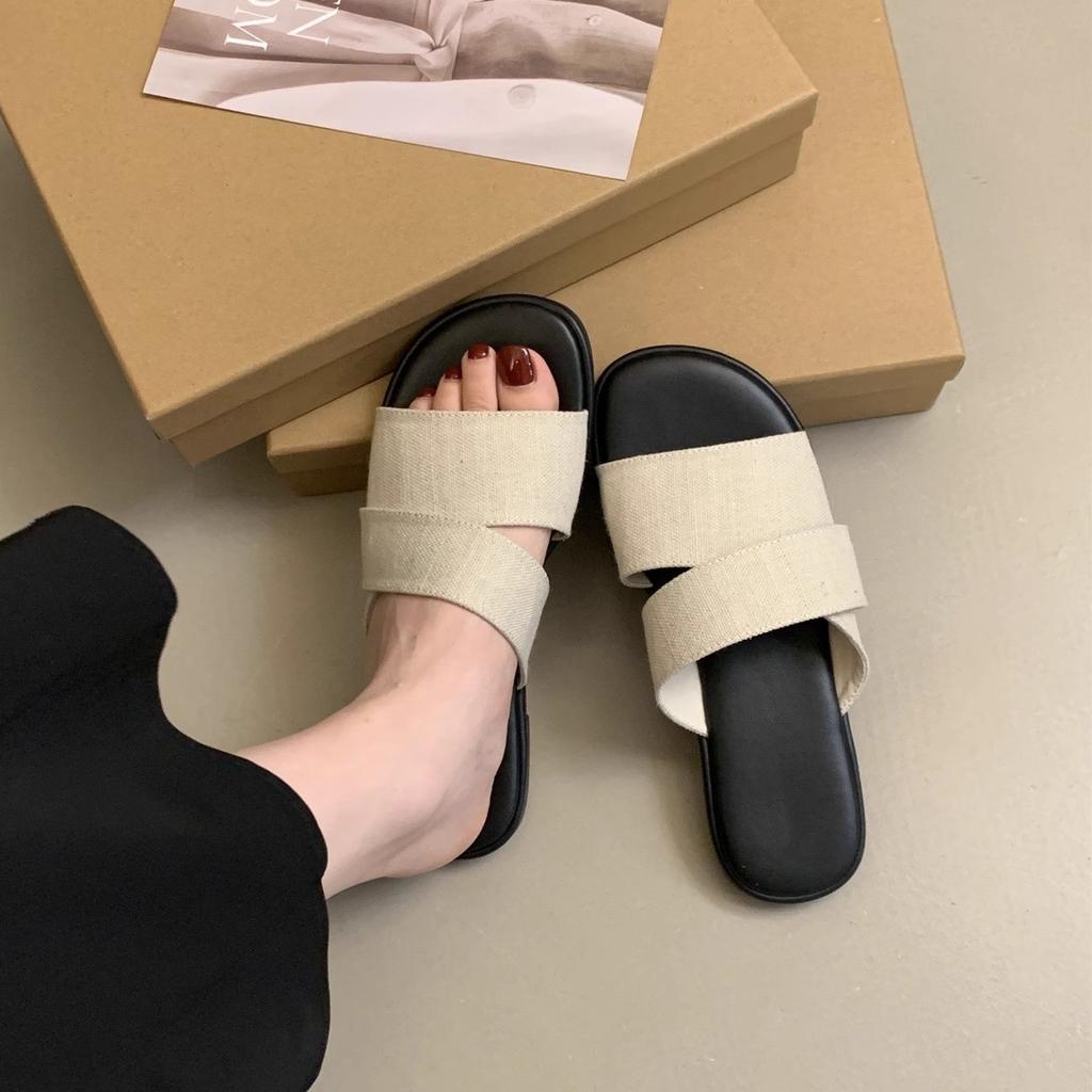 Flat-bottomed slippers women's summer wear new simple casual lazy seaside vacation wind one-word beach shoes