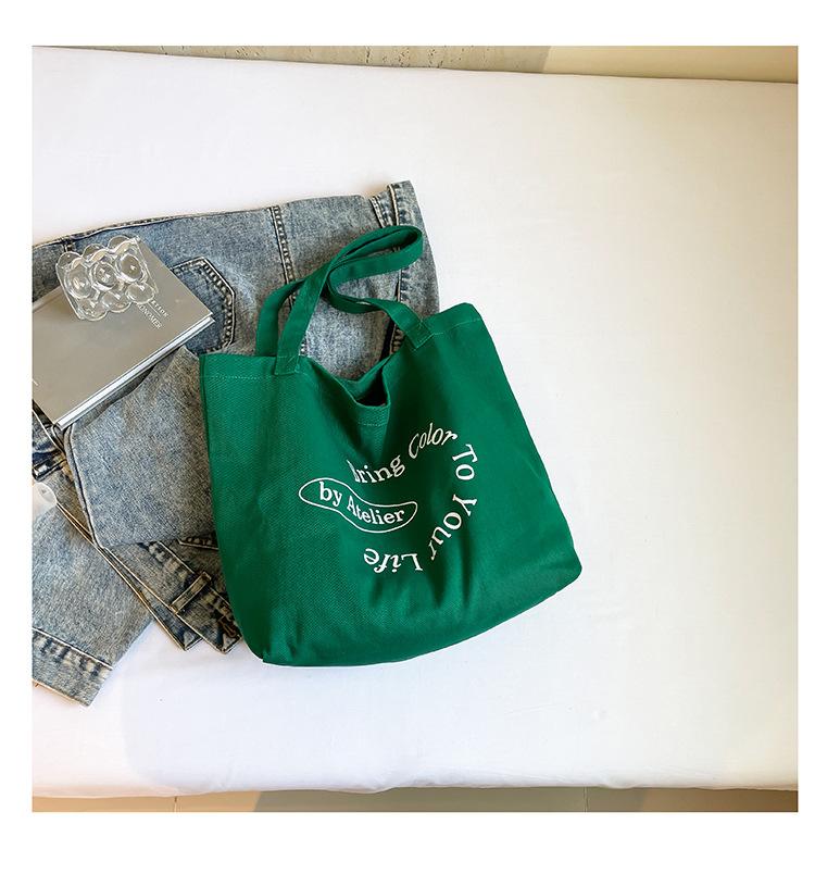 

Korean version of casual literary canvas bag ins simple letter printing handbag lazy style fashion retro shoulder bag зелёный