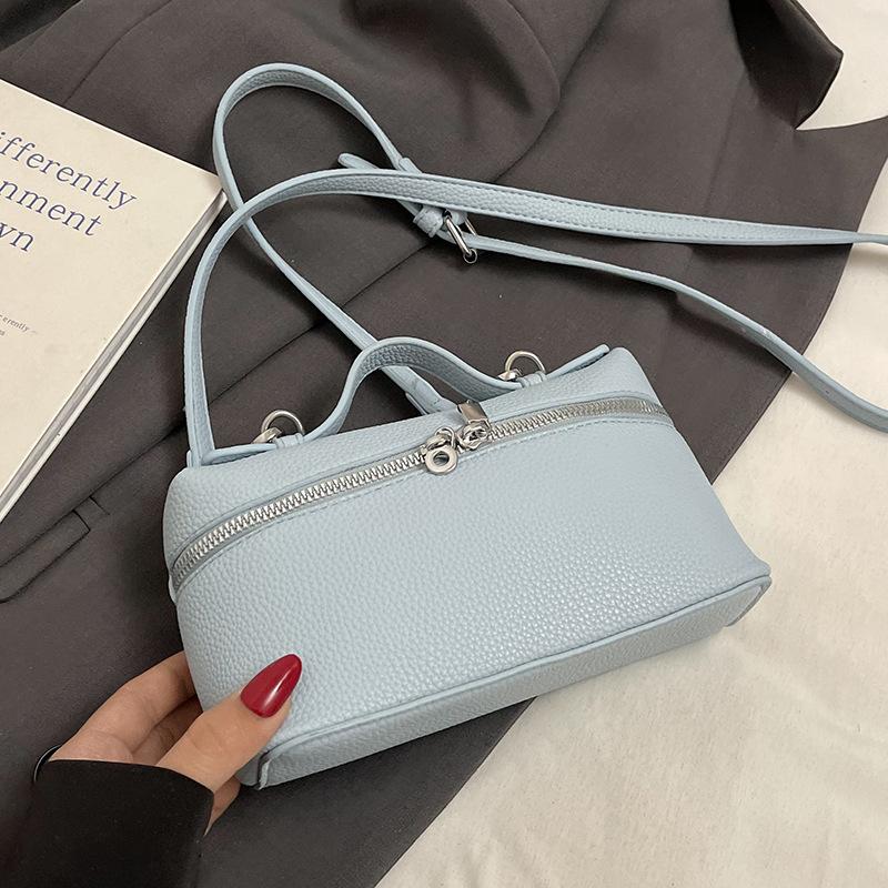 New product wholesale high-quality lychee pattern portable change bag women's versatile commuting fashion small fresh Korean messenger bag