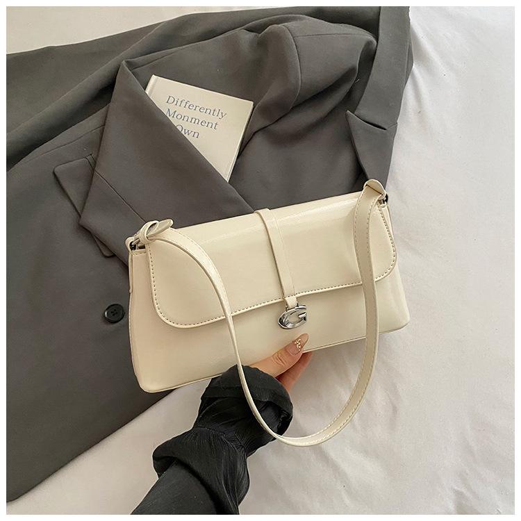 

Простая и фактурная универсальная сумка через плечо женская 2025 новая мода и высококлассная сумка для поездок на работу женская нишевая сумка под мышкой белый