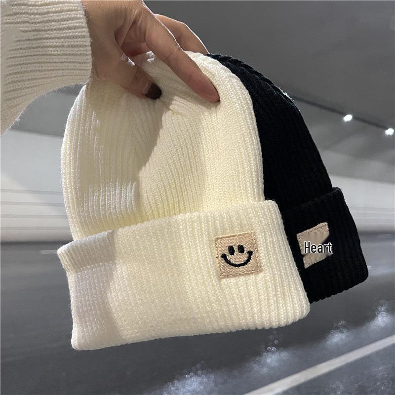 Autumn/Winter 2025 Smiley Face Woolen Knit Hat - Unisex, Warm, and Versatile Black with Ear Protection.