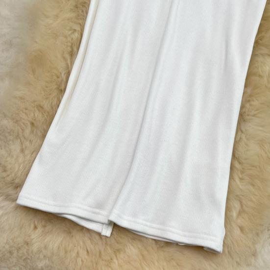 Dámská midi sukně jednobarevná s rozparkem vzadu, s vysokým pasem, rybího střihu, obepínající boky, do kanceláře, pouzdrová sukně