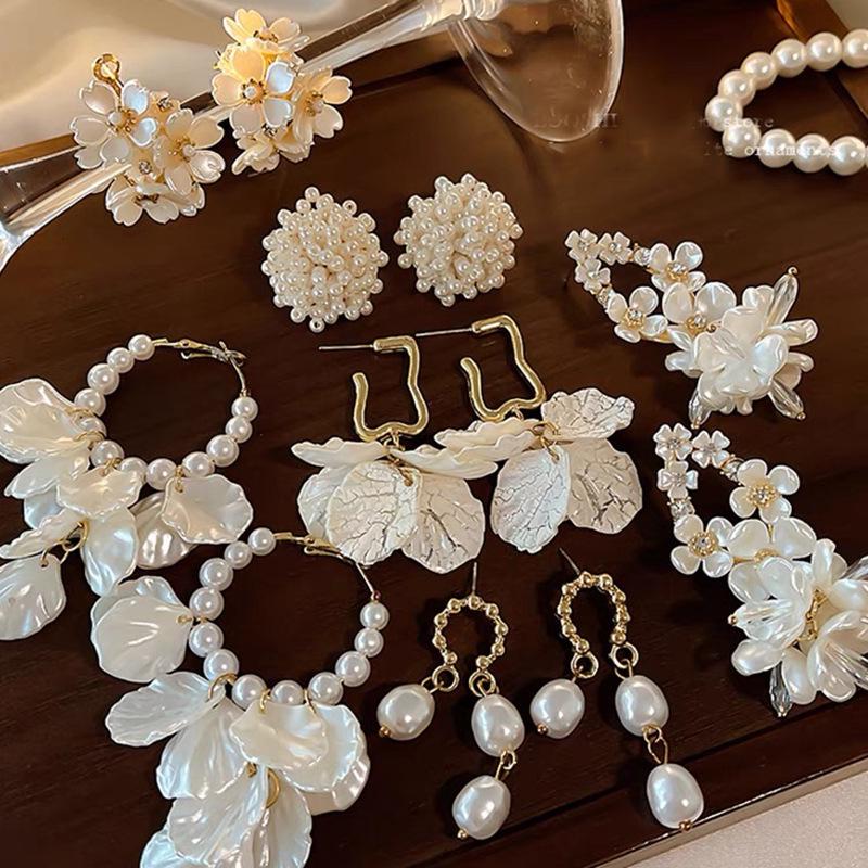 Sophisticated Silver Pearl Seashell Tassel Earrings: Elegant Light Luxury Dangle for Women