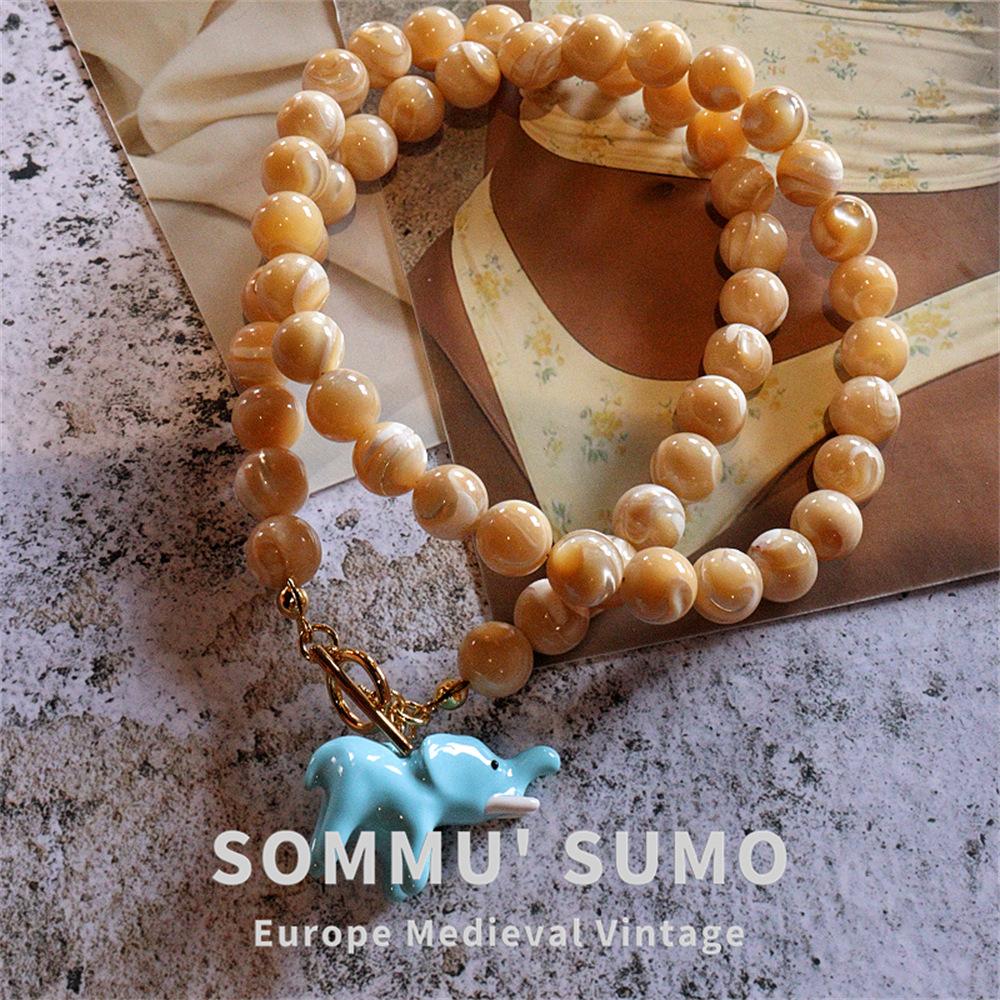 

Blue Baby Elephant Pendant Necklace Female Natural Shell Beaded Collarbone Chain Niche High-end Temperament Versatile Collarbone Chain