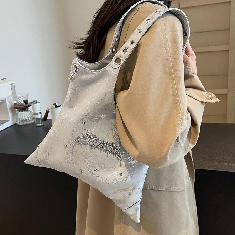 Nischendesign Dark Wind Spice Girl Handnieten-Achseltasche 2025 neu große Kapazität Schulter Crossbody Tragetasche