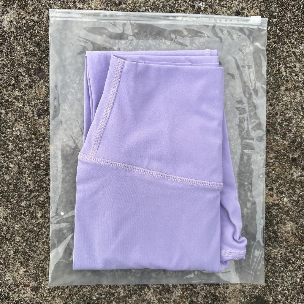 Solid Color High-Waisted Women's Yoga Leggings with Back Pocket – Soft, Elastic, and Peach Bum Enhancing