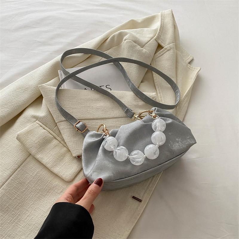 Chic And Versatile Bucket Style Cloud Handbag For Women Featuring Unique Stitching Design
