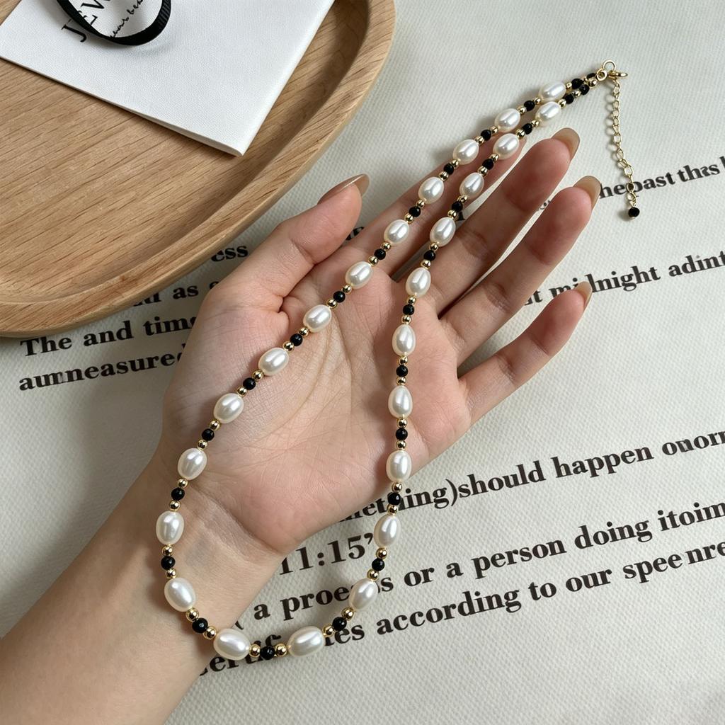 Black spinel natural freshwater pearl necklace 11K gold-wrapped light luxury niche high-end design collarbone chain female ins