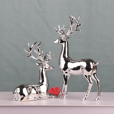 Set aus 2 versilberten Hirsch-Statuen Dekorationen aus Kunstharz Geeignet für die Dekoration von Wohnzimmern Weinschränken und Bücherregalen
