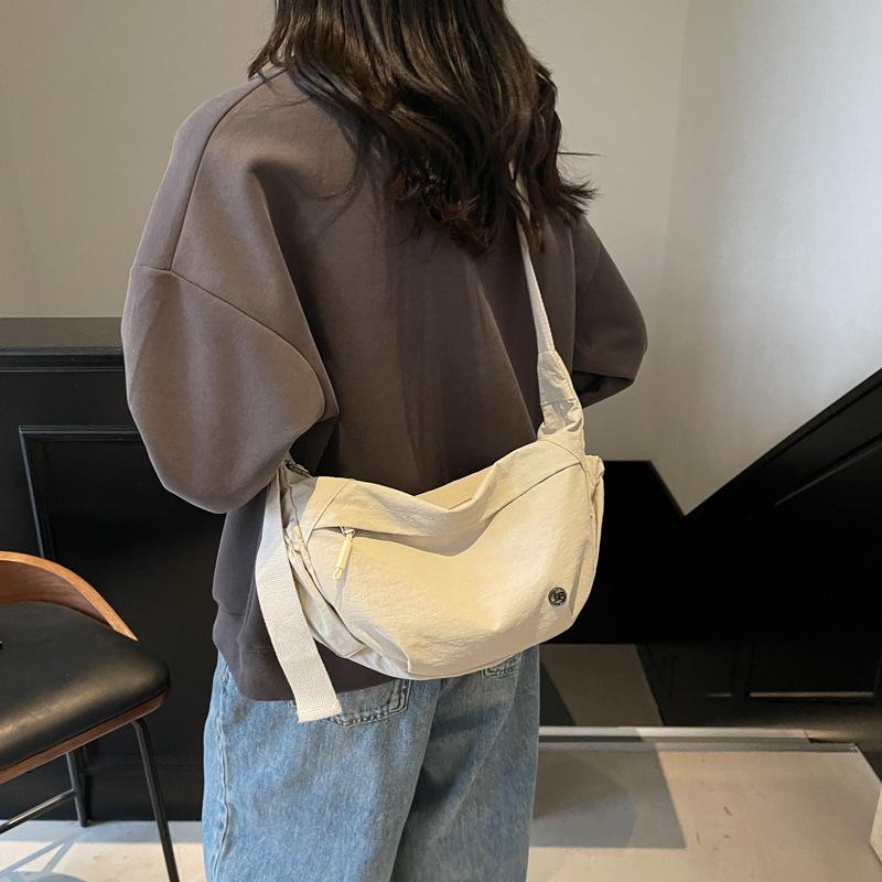 Korean version of casual nylon canvas bag women's 2025 new simple dumpling bag versatile shoulder messenger bag