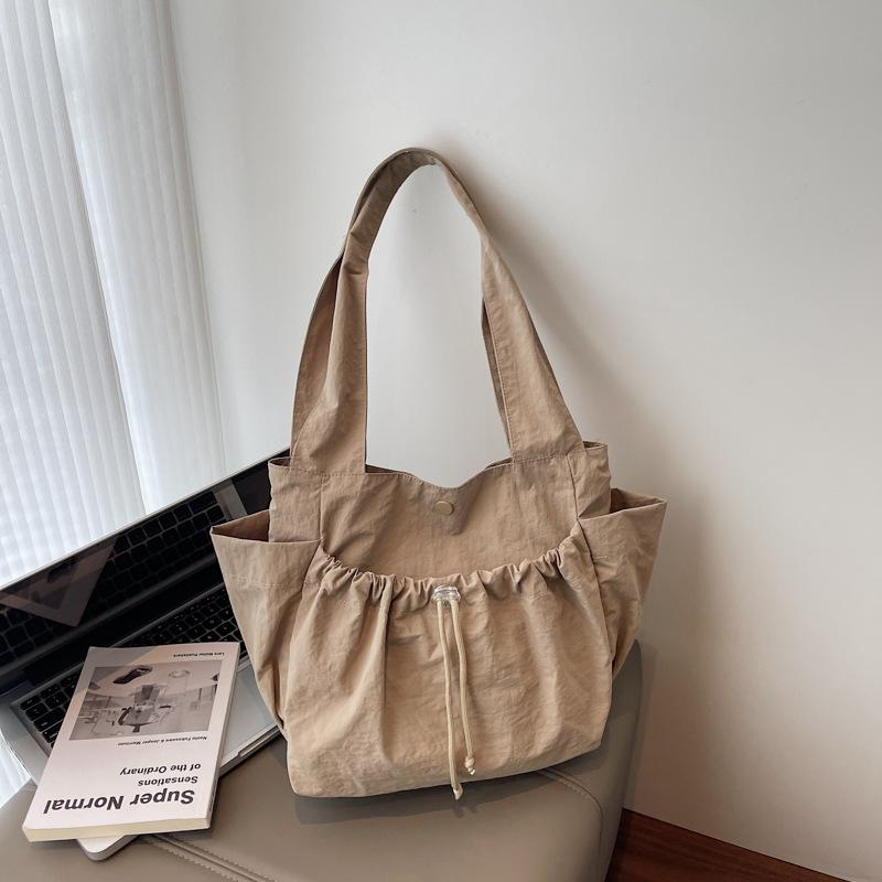 Japanese niche pleated tote bag women's large capacity 2025 summer new fashion simple casual commuter shoulder bag