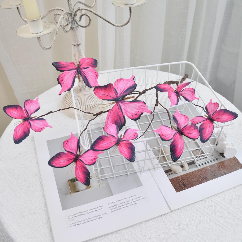 An artificial butterfly branch used for weddings, family offices, parties, decorating vases, and floral arrangements