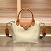 Enkel og moteriktig sommerhåndveske for kvinner, stor kapasitet, allsidig, dumplingveske med enkel skulderstropp og crossbody-stropp