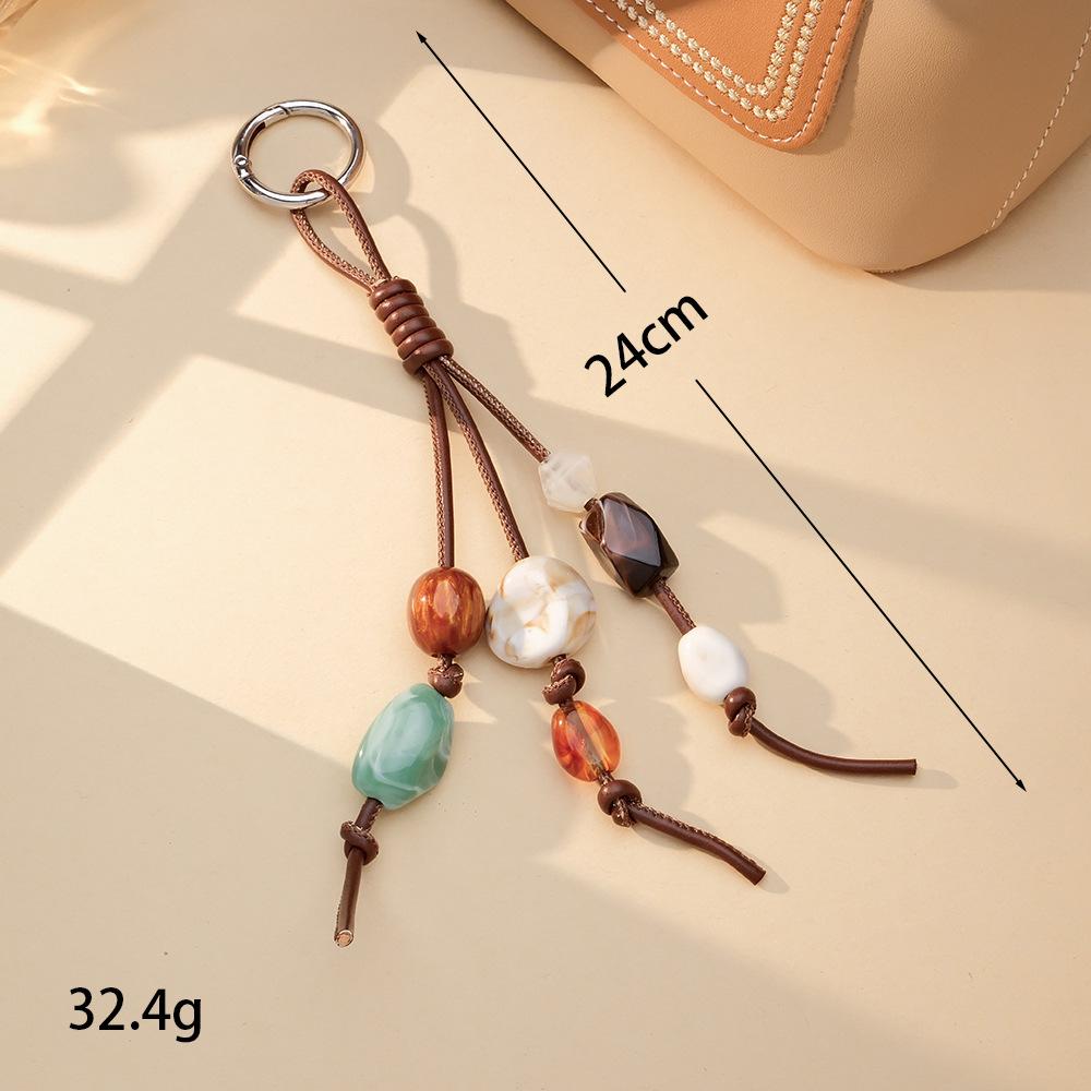 

1Pcs Retro PU leather rope hand-woven pendant, acrylic bead pendant, mobile phone hanger