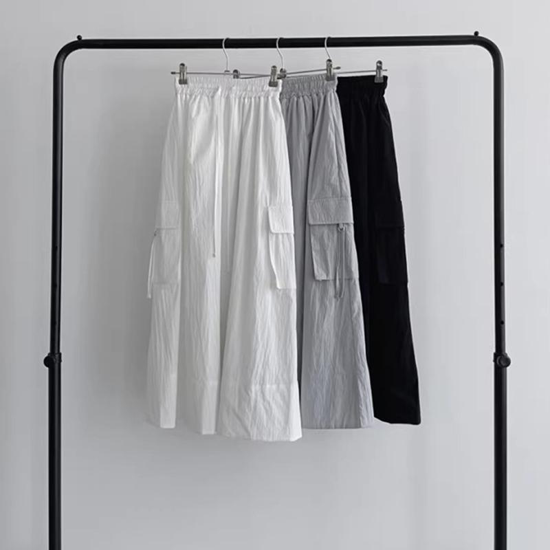 Sør-Korea elegant vårfarget retro allsidig elastisk midje snøring med store lommer design løst avslappet cargoskjørt for kvinner