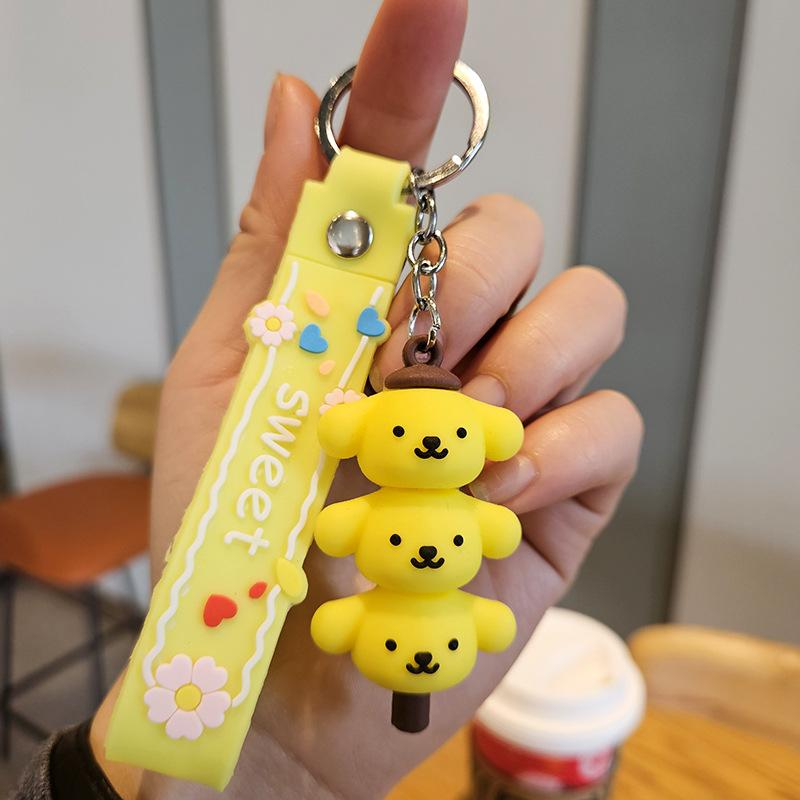 Yugui Dog Gestapelter Le Schlüsselanhänger Niedlicher Cartoon Melody Pudding Dog PVC Puppe Taschenanhänger