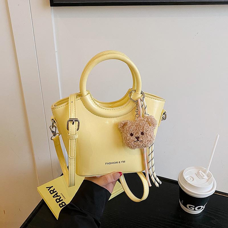 

Light luxury new commuter summer fashion bucket design sense niche portable shoulder messenger bag жовтий