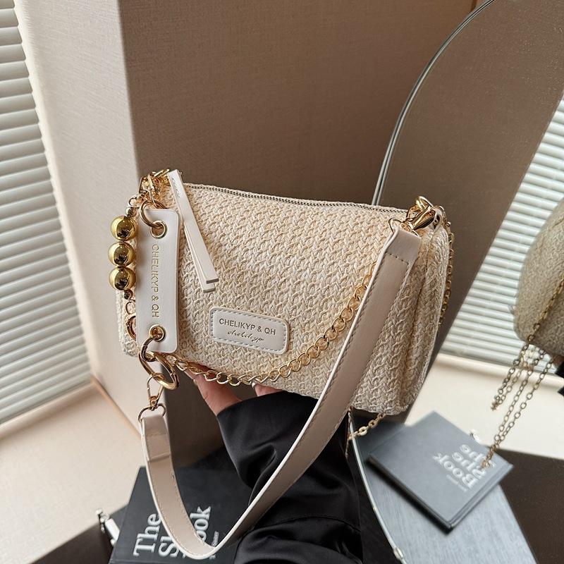 

Niche design straw woven bag women s summer new versatile chain crossbody bag single shoulder underarm pillow bag