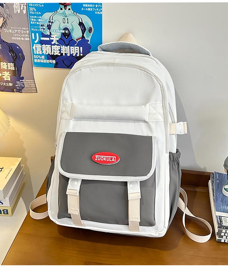 

Школьный рюкзак 2025 новый большой вместимости многосекционный корейская версия сочетание цветов, школьный рюкзак для ученика средней школы универсальный для отдыха