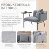 Modern single armchair with comfortable fabric backrest and two storage compartments, complemented by a practical side table.