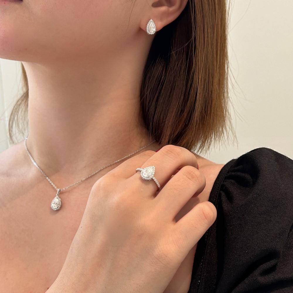 Sterling S925 Moissanite Water Drop Jewelry Set: Light Luxury Silver Ring, Earrings, and Necklace for Women.